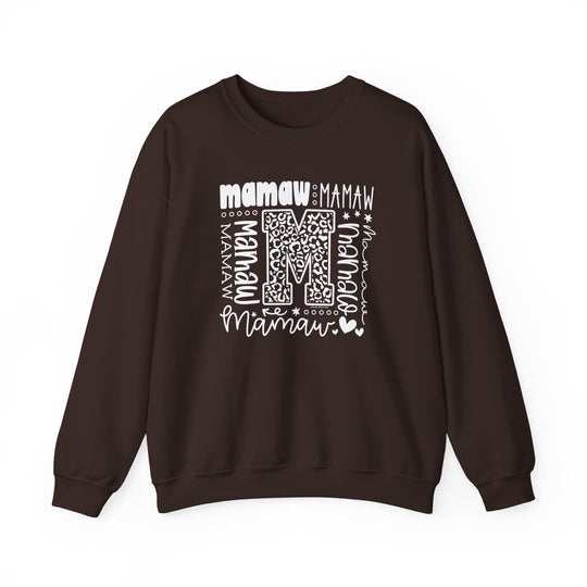 A cozy Mamaw Crew unisex sweatshirt in brown with white letters. Made of 50% cotton and 50% polyester blend for comfort and durability. Ideal for colder months with a classic fit and ribbed knit collar.