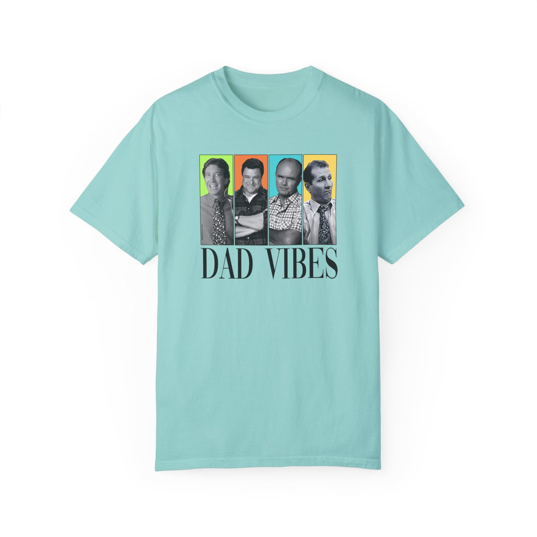 A relaxed fit Dad Vibes Tee, featuring a group of men on a blue shirt. Made of 100% ring-spun cotton, garment-dyed for extra coziness. Durable with double-needle stitching and tubular shape.