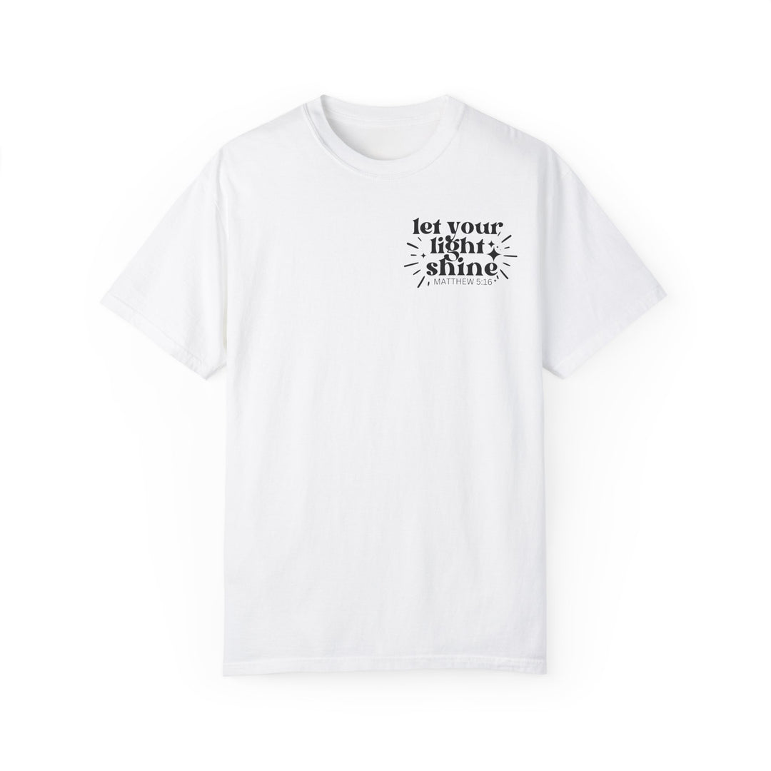 A relaxed fit Let Your Light Shine Tee, a white t-shirt with black text. Made of 100% ring-spun cotton, garment-dyed for coziness and durability. Double-needle stitching, no side-seams for a tubular shape.