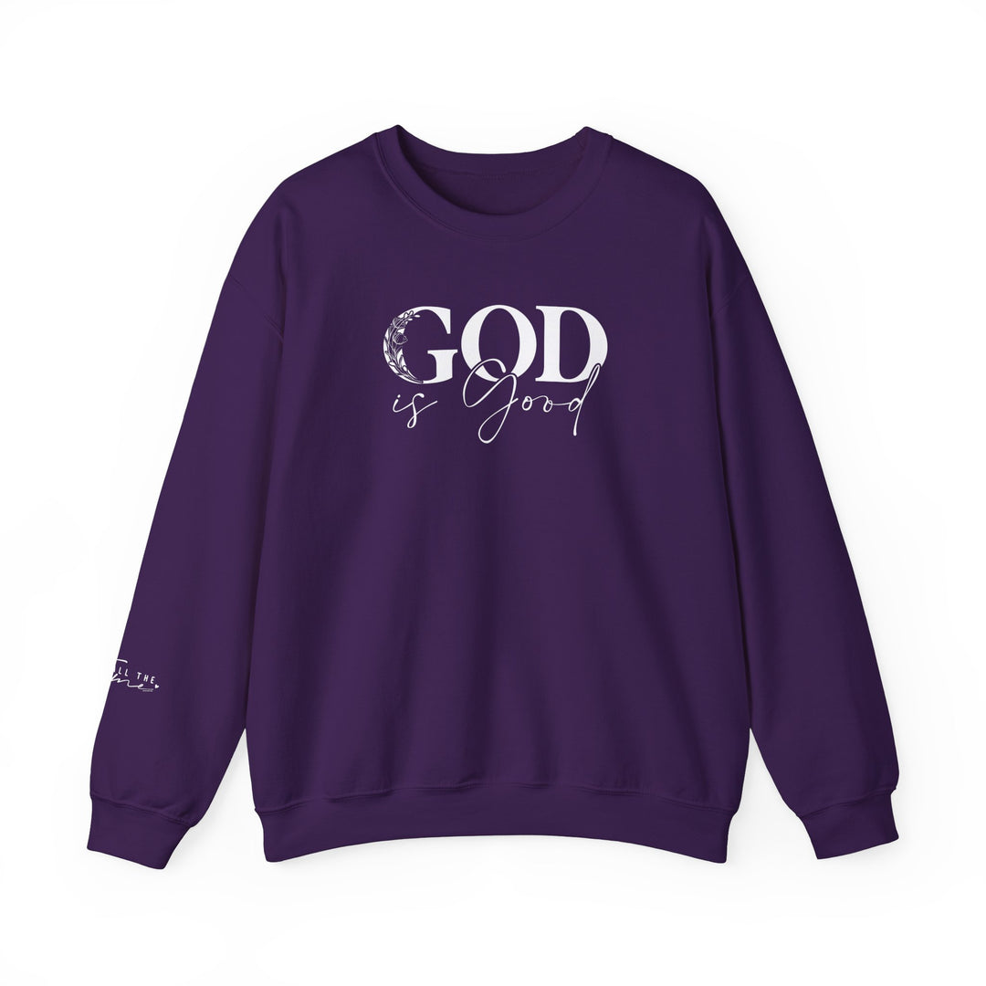 A unisex heavy blend crewneck sweatshirt featuring the title God is Good Crew. Made of 50% cotton and 50% polyester, with ribbed knit collar and double-needle stitching for durability. Ethically crafted with cozy comfort in mind.