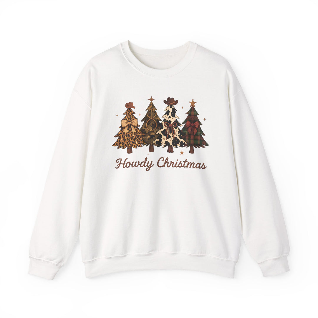 White crewneck sweatshirt with Howdy Christmas graphic, featuring four Western-themed Christmas trees with unique patterns and rustic script text beneath.