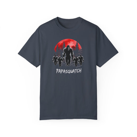 Papasquatch Tee: A relaxed-fit t-shirt featuring a bigfoot and red moon design. 100% ring-spun cotton, durable double-needle stitching, and seamless sides for a tubular shape. Ideal for everyday comfort.