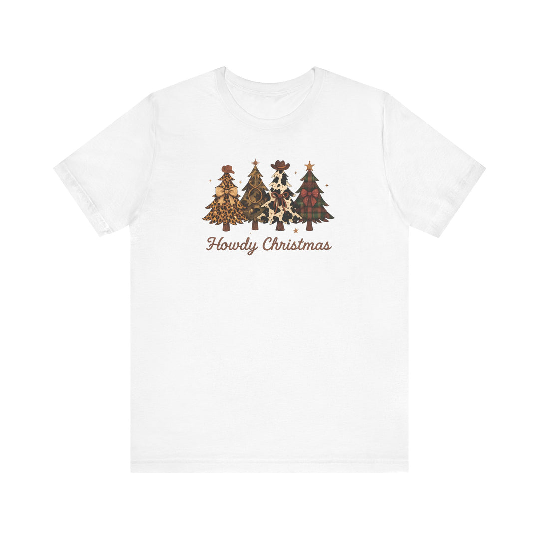 Howdy Christmas Tee featuring four Western-inspired Christmas trees with bows, stars, and cowboy hats, and the phrase “Howdy Christmas” in script font on a white T-shirt.