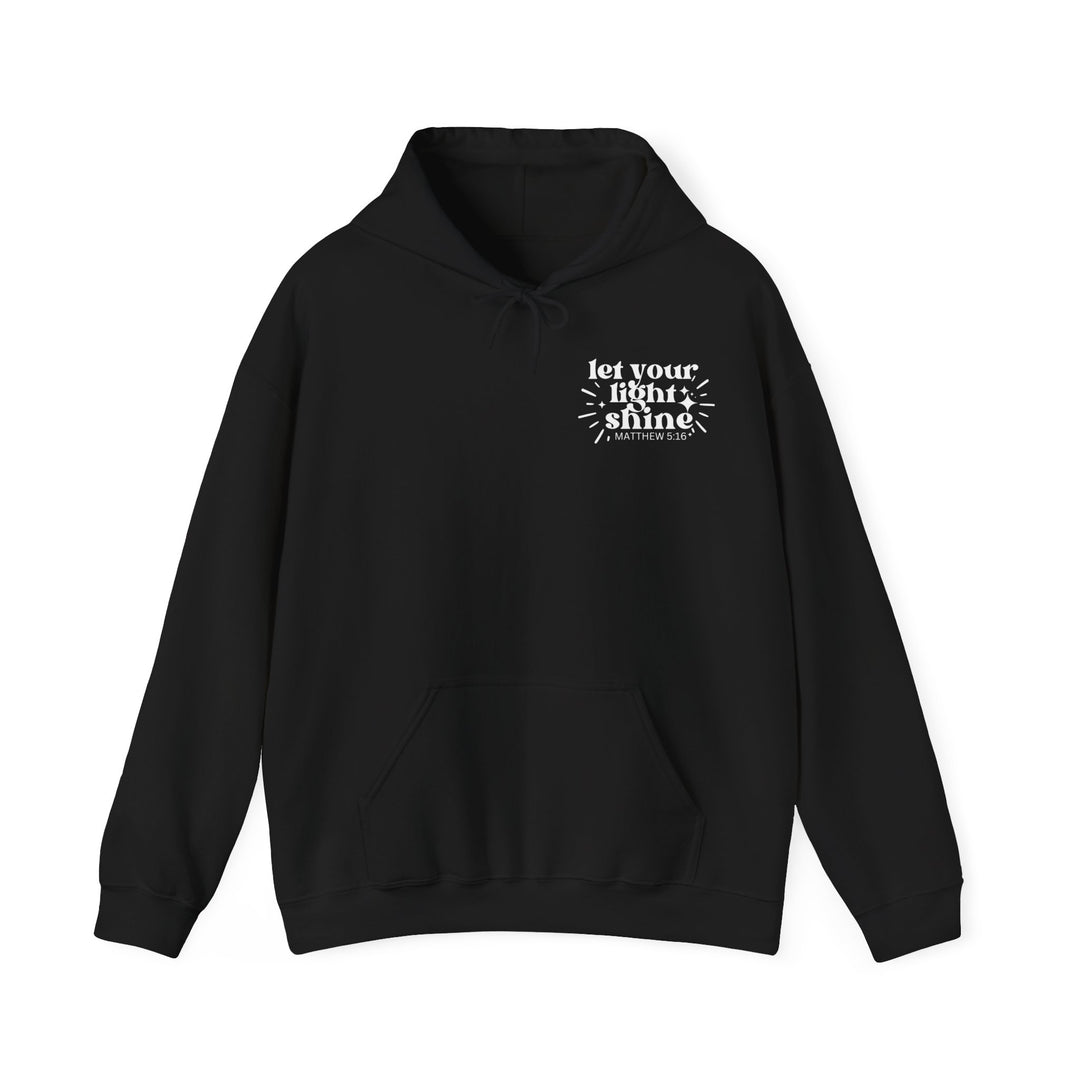 A black hooded sweatshirt with white text, featuring a kangaroo pocket and drawstring hood. Unisex heavy blend for warmth and comfort. Let Your Light Shine Hoodie by Worlds Worst Tees.