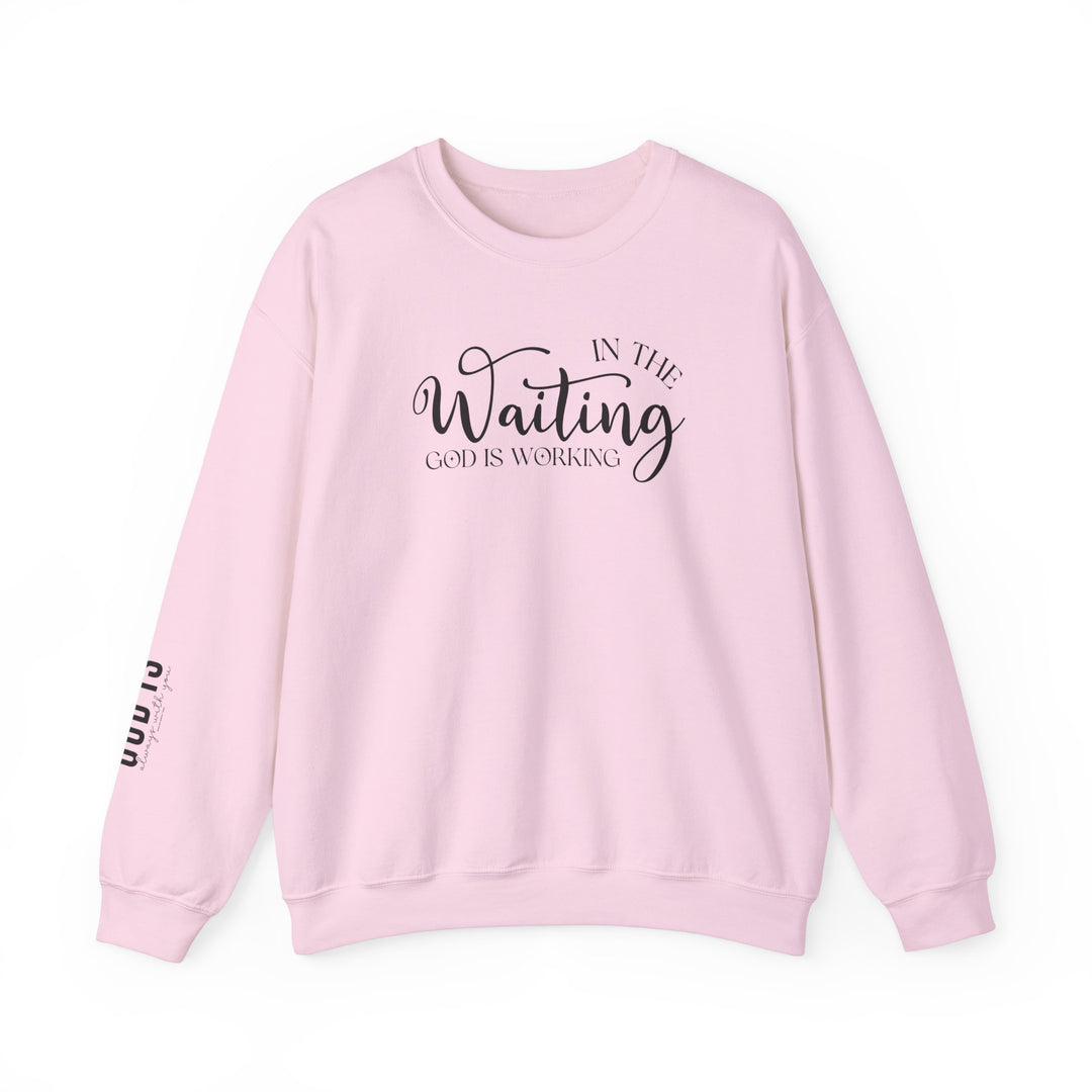 A unisex heavy blend crewneck sweatshirt featuring God is Working Crew text. Made of 50% cotton, 50% polyester with ribbed knit collar. Medium-heavy fabric, loose fit, true to size.
