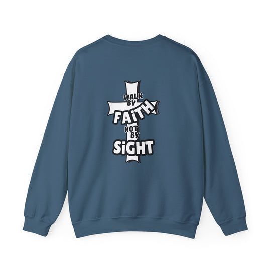 A blue sweatshirt featuring Walk By Faith Not By Sight text, ideal for comfort in a heavy blend crewneck style. Unisex, ribbed knit collar, no itchy seams, cotton-polyester fabric blend. Sizes S-5XL.