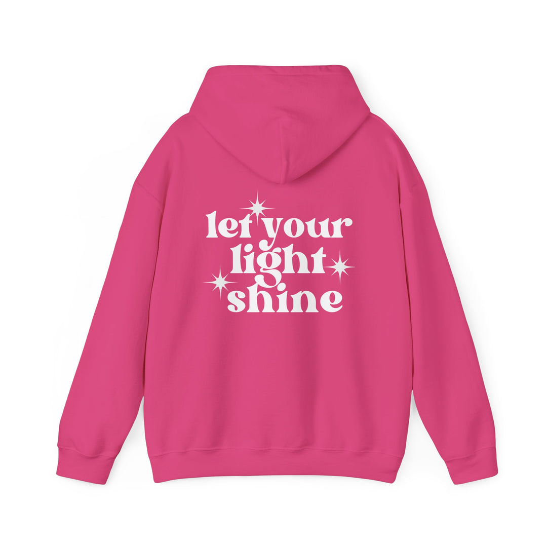 Unisex Let Your Light Shine Hoodie: Pink hoodie with white text, kangaroo pocket, and drawstring hood. Cotton-polyester blend for warmth and comfort. Worlds Worst Tees product.