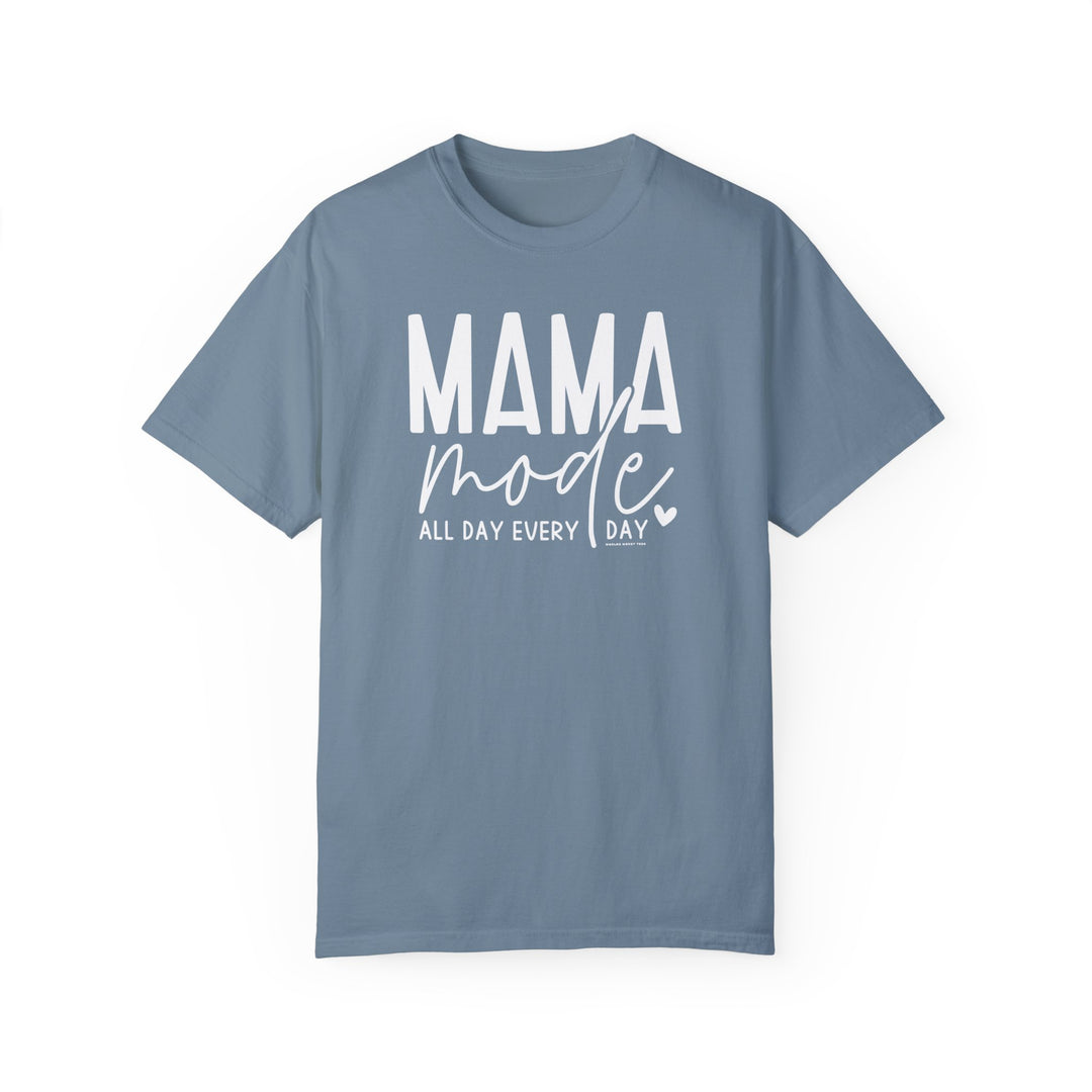 A blue Mama Mode Tee, 100% ring-spun cotton, garment-dyed for coziness. Relaxed fit, double-needle stitching for durability, seamless design. Ideal for daily wear.