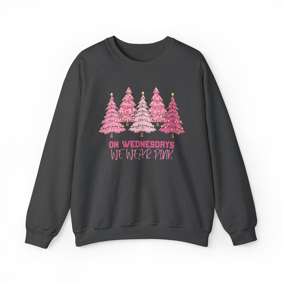 Unisex heavy blend crewneck sweatshirt featuring pink trees and stars, ideal for comfort. 50% cotton, 50% polyester, loose fit, ribbed knit collar, no itchy side seams. Runs true to size.