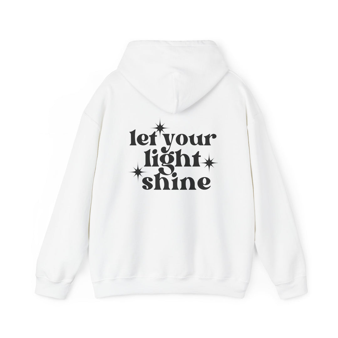 A cozy unisex Let Your Light Shine Hoodie, white with black text. Features kangaroo pocket, drawstring hood, cotton-poly blend for warmth and comfort. Perfect for chilly days. Classic fit, tear-away label, true to size.