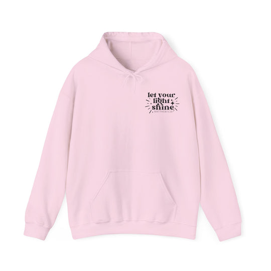Unisex Let Your Light Shine Hoodie: Pink sweatshirt with hood and kangaroo pocket. Cotton-polyester blend for warmth and comfort. Classic fit, tear-away label, true to size. From Worlds Worst Tees.