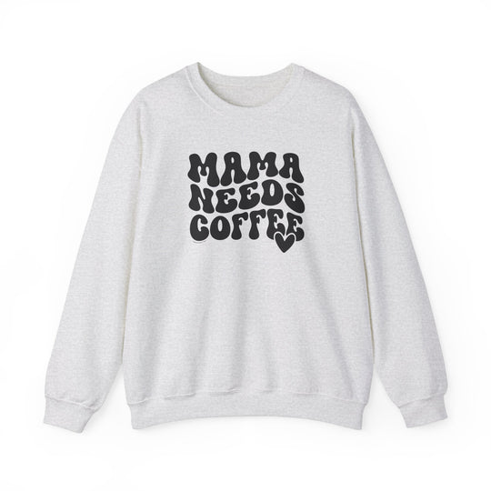 A cozy Mama Needs Coffee Crew unisex sweatshirt with ribbed knit collar, no itchy seams, and a loose fit. 50% cotton, 50% polyester blend, medium-heavy fabric. Sizes S-5XL.