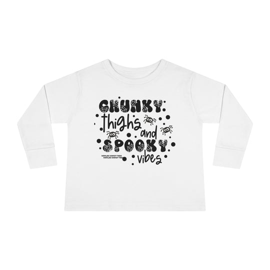 Chunky Thighs and Spooky Vibes Toddler Long Sleeve Tee, featuring black text on white fabric. Made of 100% combed ringspun cotton, with topstitched ribbed collar for durability and EasyTear™ label for sensitive skin.