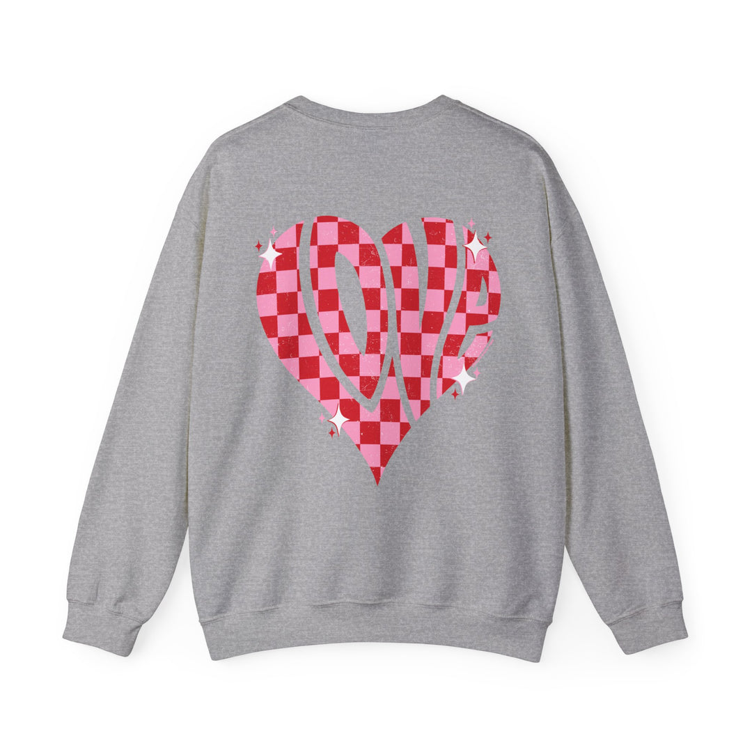 A cozy grey Love Crew sweatshirt with a heart design. Unisex, heavy blend fabric for comfort. Ribbed knit collar, no itchy seams. Sizes S-5XL. Made of 50% cotton, 50% polyester.