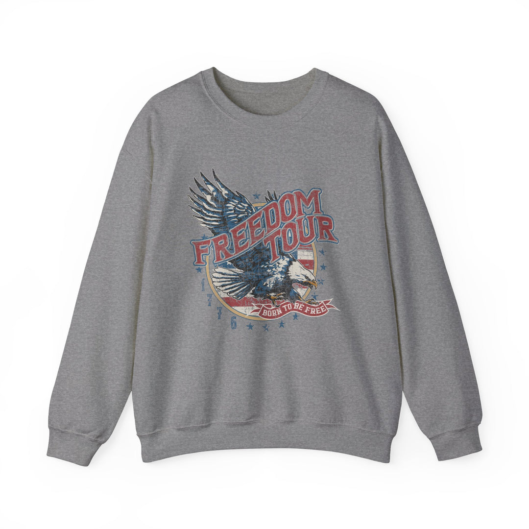 A grey crewneck sweatshirt featuring an American Freedom Crew graphic design. Unisex heavy blend with ribbed knit collar, 50% cotton 50% polyester, loose fit, no itchy side seams. Ideal for comfort and style.
