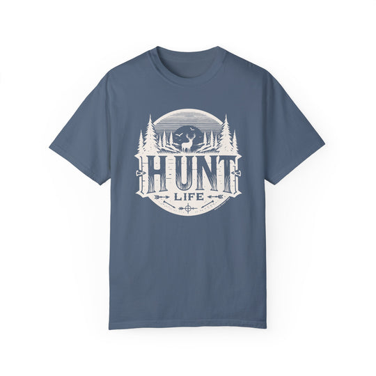 A relaxed fit Hunt Life Tee, crafted from 100% ring-spun cotton. Garment-dyed for coziness, featuring double-needle stitching for durability and a seamless design for a tubular shape.