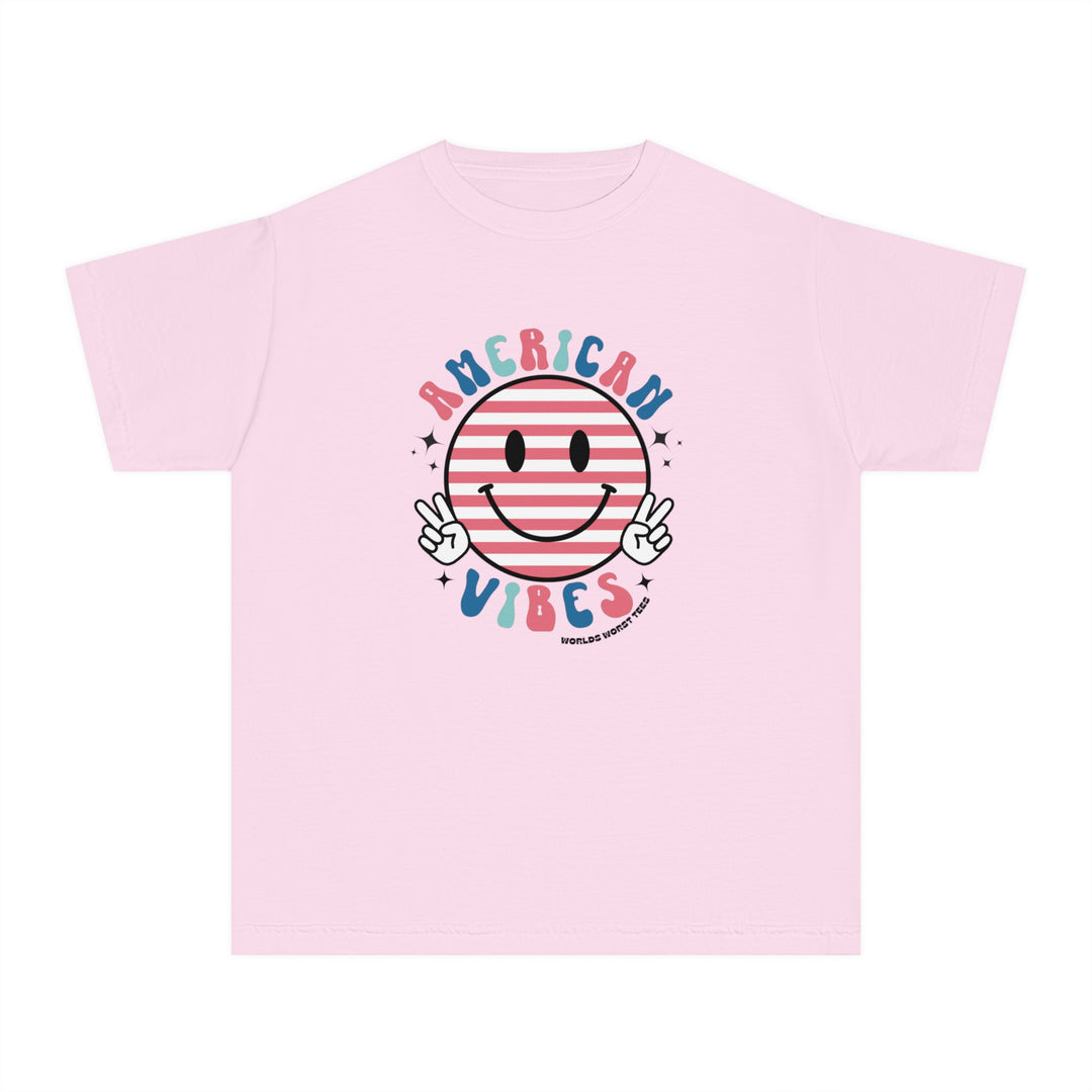 American Vibes Youth Tee: A pink t-shirt with a smiley face design, perfect for active kids. 100% combed ringspun cotton, soft-washed, and garment-dyed for comfort. Classic fit for all-day wear.