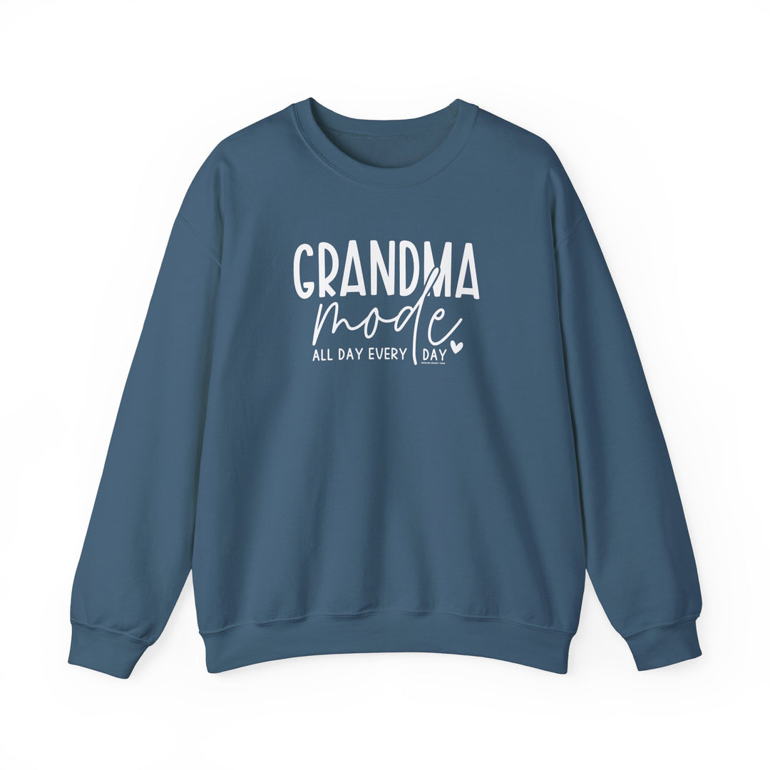 A unisex heavy blend crewneck sweatshirt, Grandma Mode Crew, in blue with white text. Made of 50% cotton, 50% polyester, ribbed knit collar, no itchy side seams, loose fit, medium-heavy fabric.
