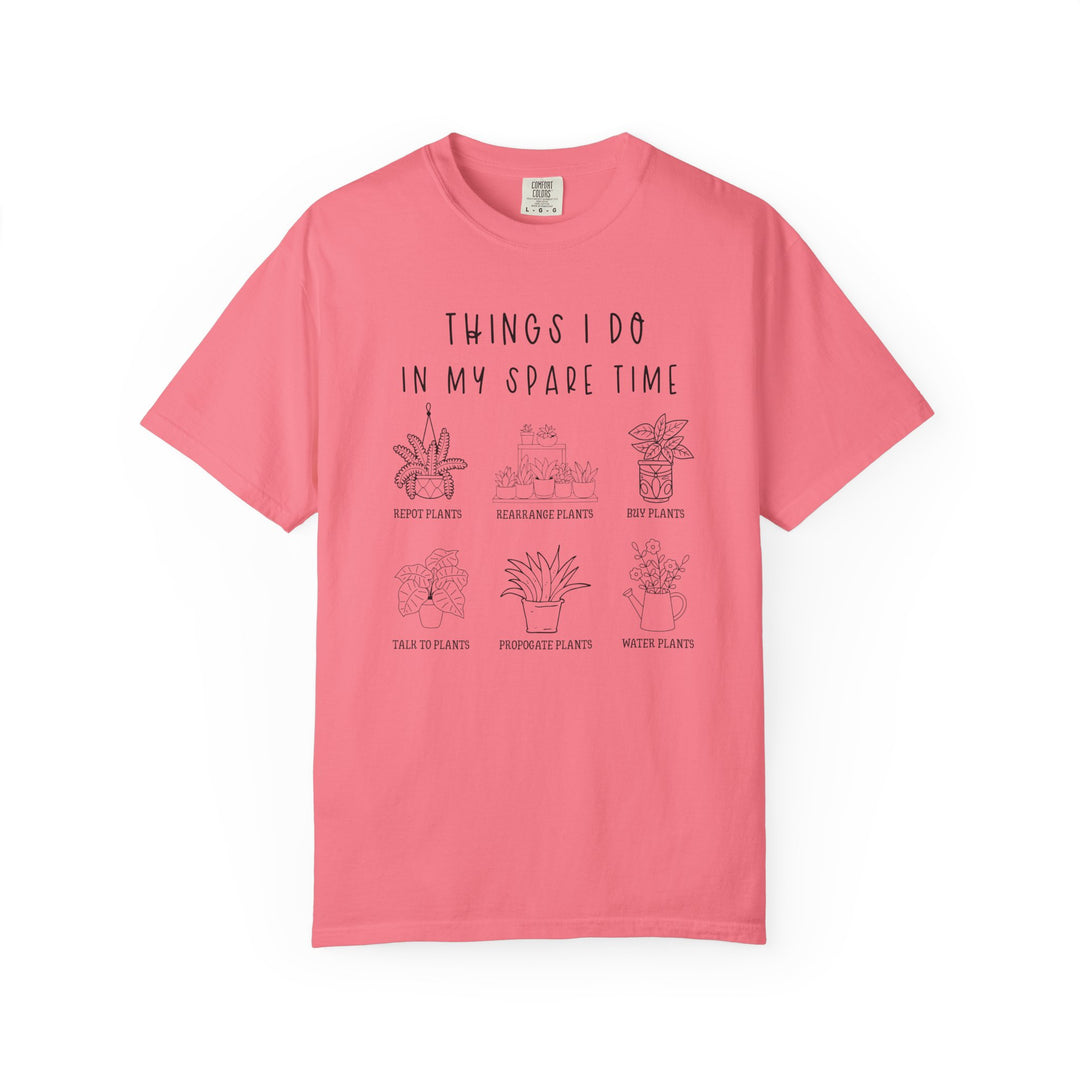 Pink Plants Spare Time Tee featuring a plant-lover's checklist with six line-drawings, highlighting activities like repotting and watering plants. Made of soft, durable ring-spun cotton.