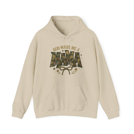 Light-beige pullover hoodie features GOD MADE ME A MAMA with camo MAMA graphic, bow, floral accents, and a kangaroo pocket. Cozy cotton-polyester blend.