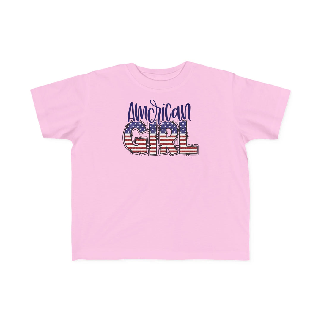 American Girl Toddler Tee featuring a pink shirt with text, ideal for sensitive skin. Made of 100% combed ringspun cotton, light fabric, classic fit, and tear-away label. Available in sizes 2T to 5-6T.