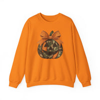 Jackie O Crew: Orange sweatshirt with camo-patterned jack-o-lantern graphic topped with an orange bow, ideal for cozy, playful Halloween style.