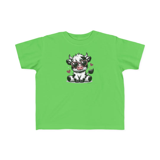 Cute Cow Toddler Tee featuring a cartoon cow in sunglasses on a green shirt. Soft 100% combed ringspun cotton, light fabric, tear-away label, and classic fit. Sizes: 2T, 3T, 4T, 5-6T.