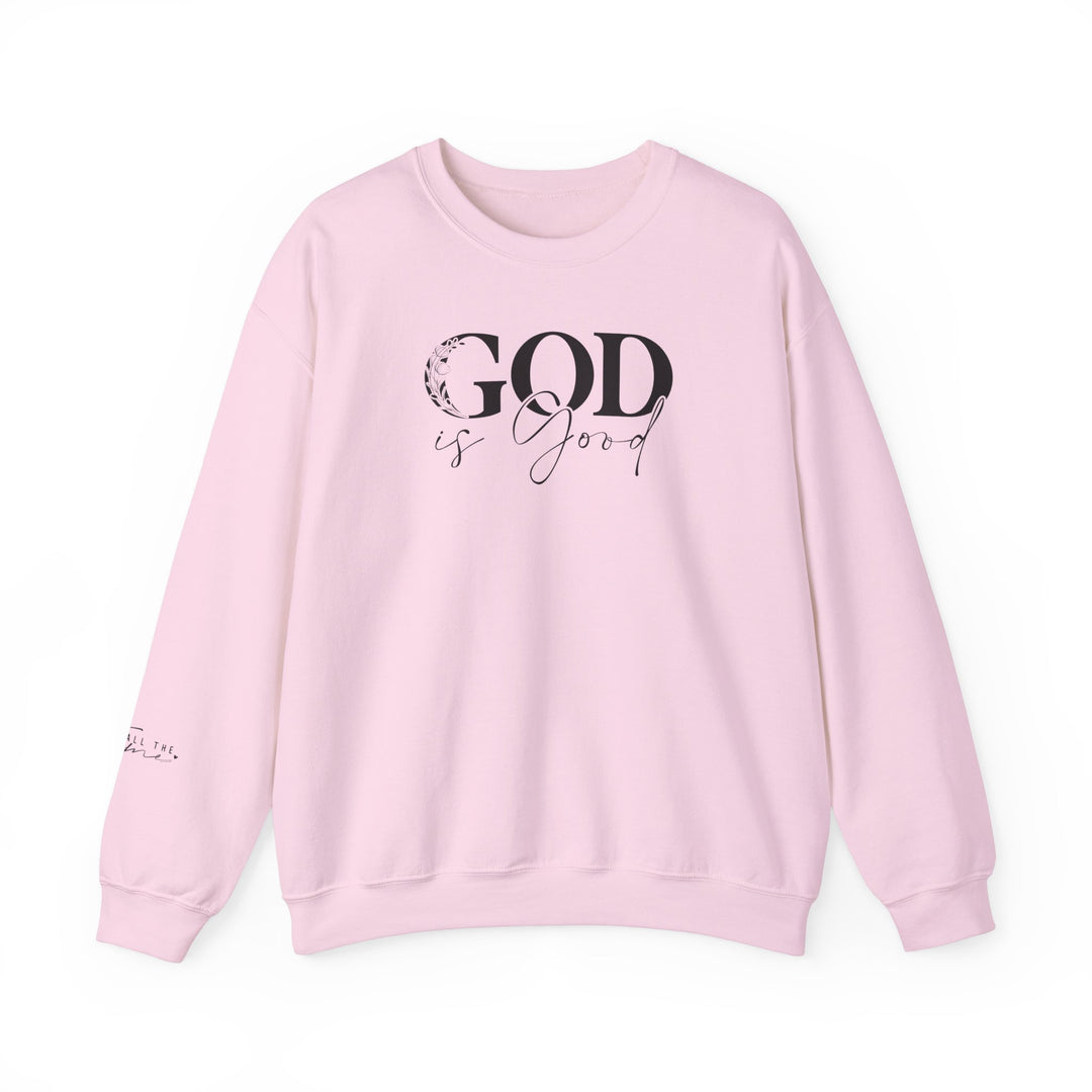 Unisex God is Good Crew sweatshirt in pink with black text. Medium-heavy 50% cotton, 50% polyester fabric for cozy wear. Ribbed knit collar, classic fit, and double-needle stitching for durability. Ethically made in the US.