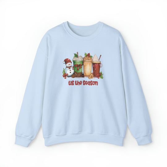 Tis the season Christmas Crew unisex sweatshirt featuring a snowman and drinks design. Heavy blend fabric, ribbed knit collar, no itchy seams. Sizes from S to 5XL. Made of 50% cotton, 50% polyester.