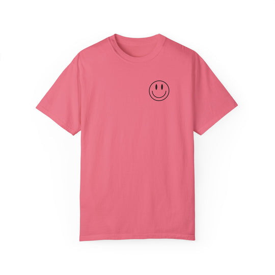 A pink Be the reason Tee t-shirt with a smiley face graphic. 100% ring-spun cotton, medium weight, relaxed fit, double-needle stitching, no side-seams for durability and shape retention.