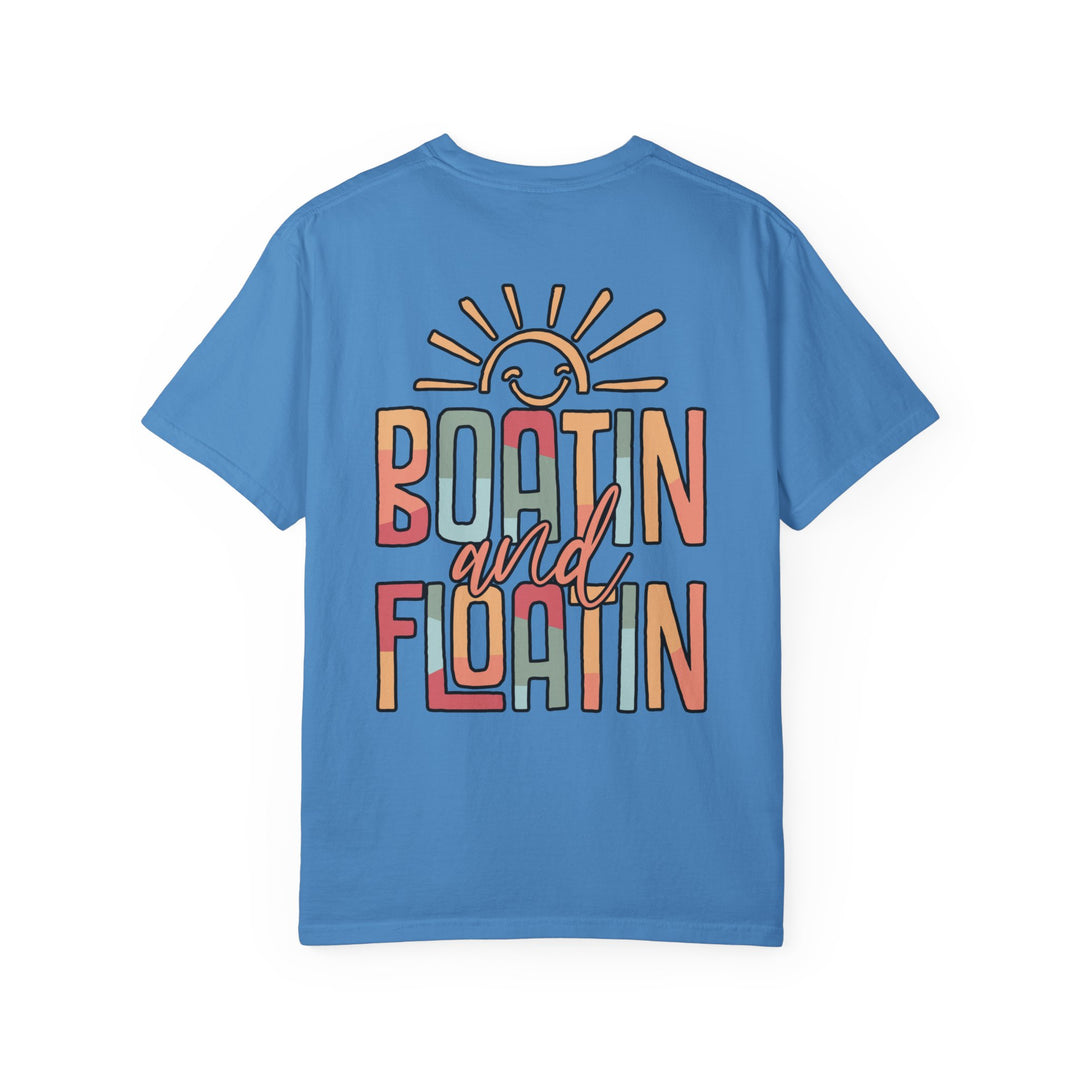 Boatin and Floatin Tee, a relaxed-fit, garment-dyed t-shirt made from 100% ring-spun cotton, showcasing durable double-needle stitching and a classic crew neckline.