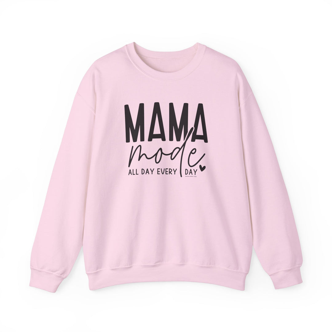 A pink Mama Mode Crew sweatshirt with black text. Unisex heavy blend crewneck made of 50% cotton, 50% polyester, ribbed knit collar, no itchy side seams. Medium-heavy fabric, loose fit, true to size.