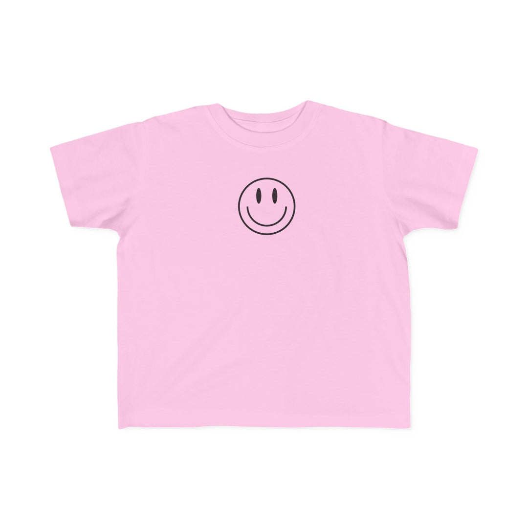 Toddler tee with a pink smiley face print, soft 100% combed ringspun cotton, light fabric, classic fit, tear-away label. Perfect for sensitive skin, ideal for little adventurers.