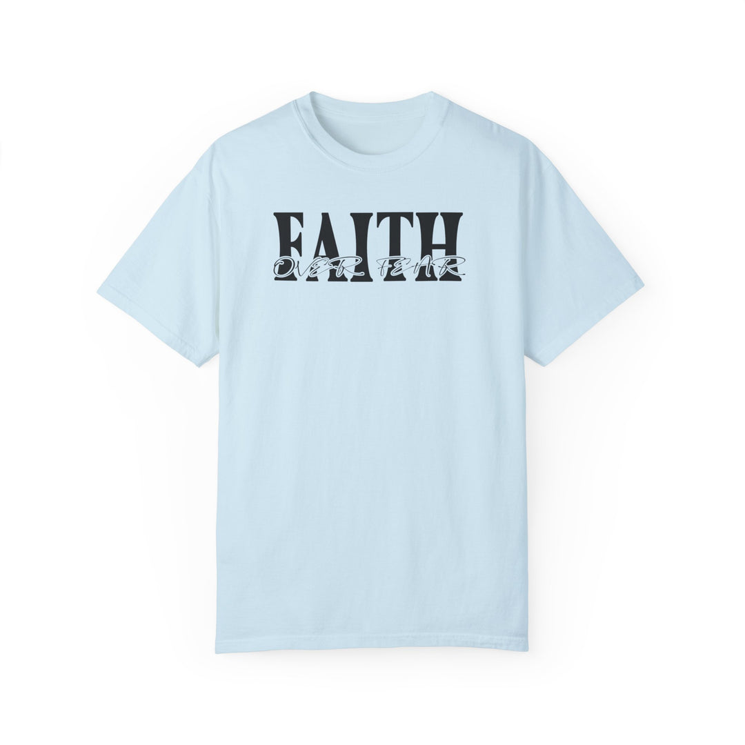 A Faith Over Fear Tee in light blue with black text, showcasing a logo on a ring-spun cotton t-shirt. Relaxed fit, double-needle stitching, and seamless design for durability and comfort.