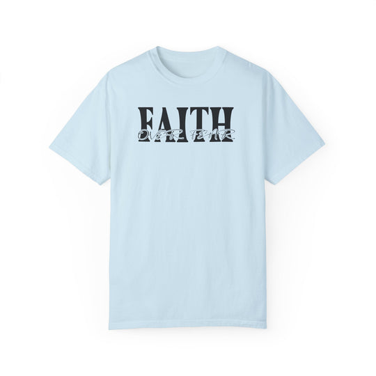 A Faith Over Fear Tee in light blue with black text, showcasing a logo on a ring-spun cotton t-shirt. Relaxed fit, double-needle stitching, and seamless design for durability and comfort.