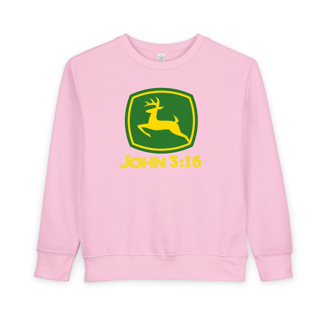 Light-pink toddler crewneck sweatshirt with a spoof John Deere logo, featuring a yellow deer and John 3:16 text, offering warmth and comfort.