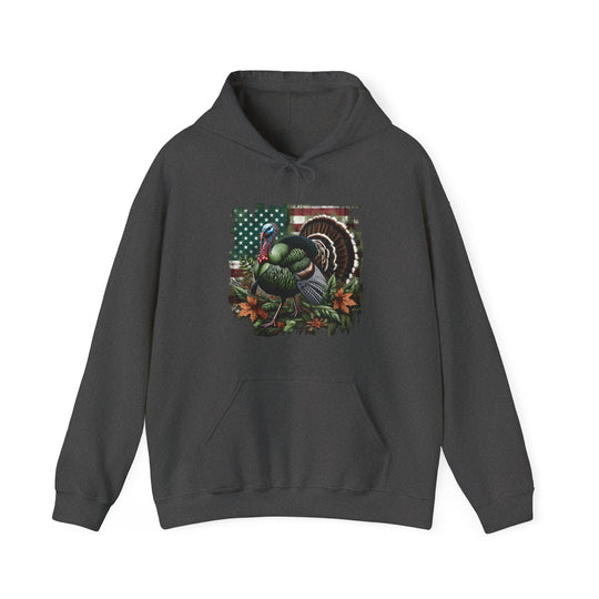 A grey Turkey Hunting Hoodie, a blend of cotton and polyester, featuring a turkey design. Unisex, heavy fabric with kangaroo pocket and drawstring hood. Sizes S to 5XL. Classic fit, tear-away label.