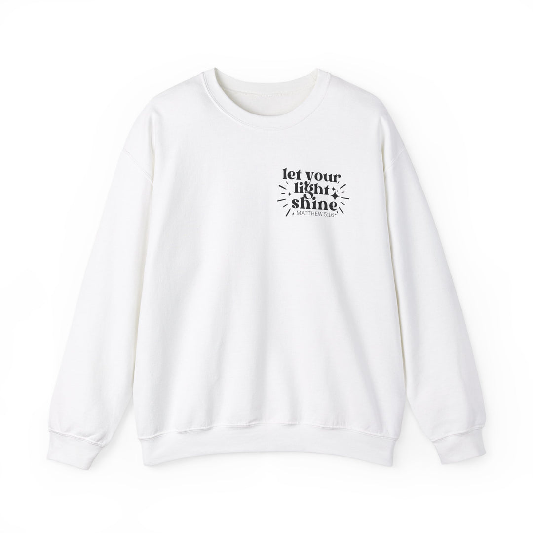 A unisex heavy blend crewneck sweatshirt featuring Let Your Light Shine text. Made of 50% cotton and 50% polyester, ribbed knit collar, no itchy side seams. Medium-heavy fabric, loose fit, true to size.