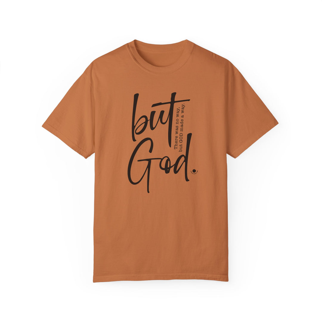 A relaxed fit But God Tee, garment-dyed for extra coziness. Made of 100% ring-spun cotton with double-needle stitching for durability. No side-seams for a tubular shape.