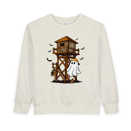 Ghost Hunter Toddler Crew sweatshirt featuring a playful Halloween hunting scene with a cartoon ghost in hiking boots and a Ghost Hunter cap near a deer-watch tower.
