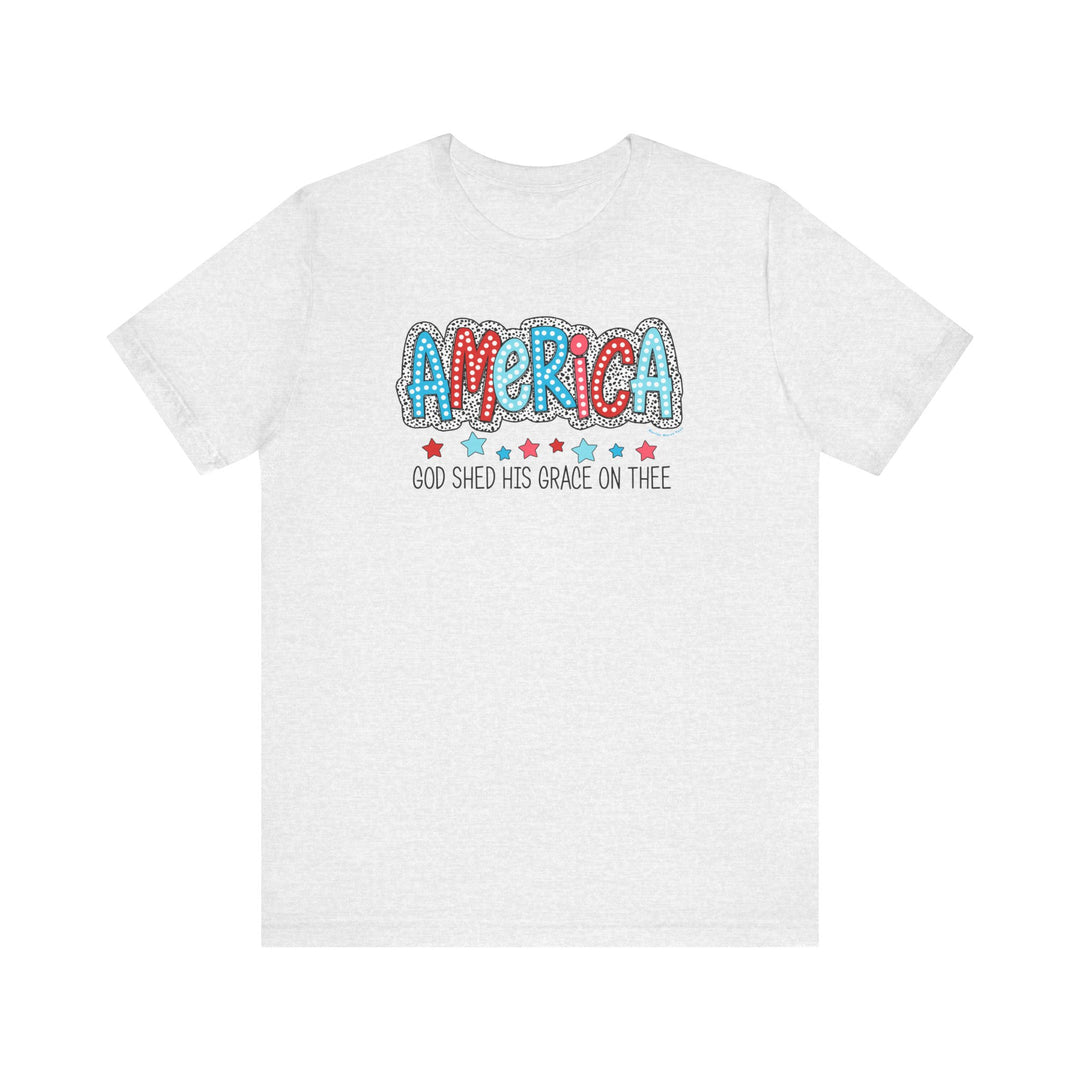 A classic white tee with red and blue text, featuring God Shed His Grace on Thee design. Unisex jersey shirt made of 100% cotton, retail fit, tear away label, and ribbed knit collars for comfort.