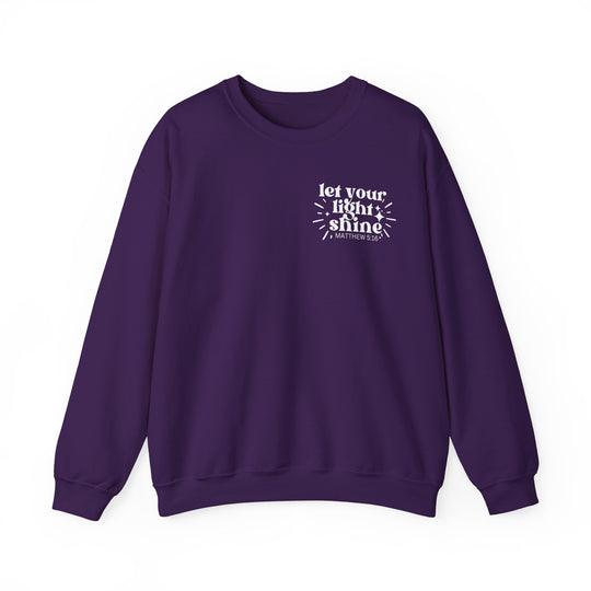 A unisex heavy blend crewneck sweatshirt featuring Let Your Light Shine text. Ribbed knit collar, no itchy side seams. 50% Cotton 50% Polyester, medium-heavy fabric, loose fit, sewn-in label.