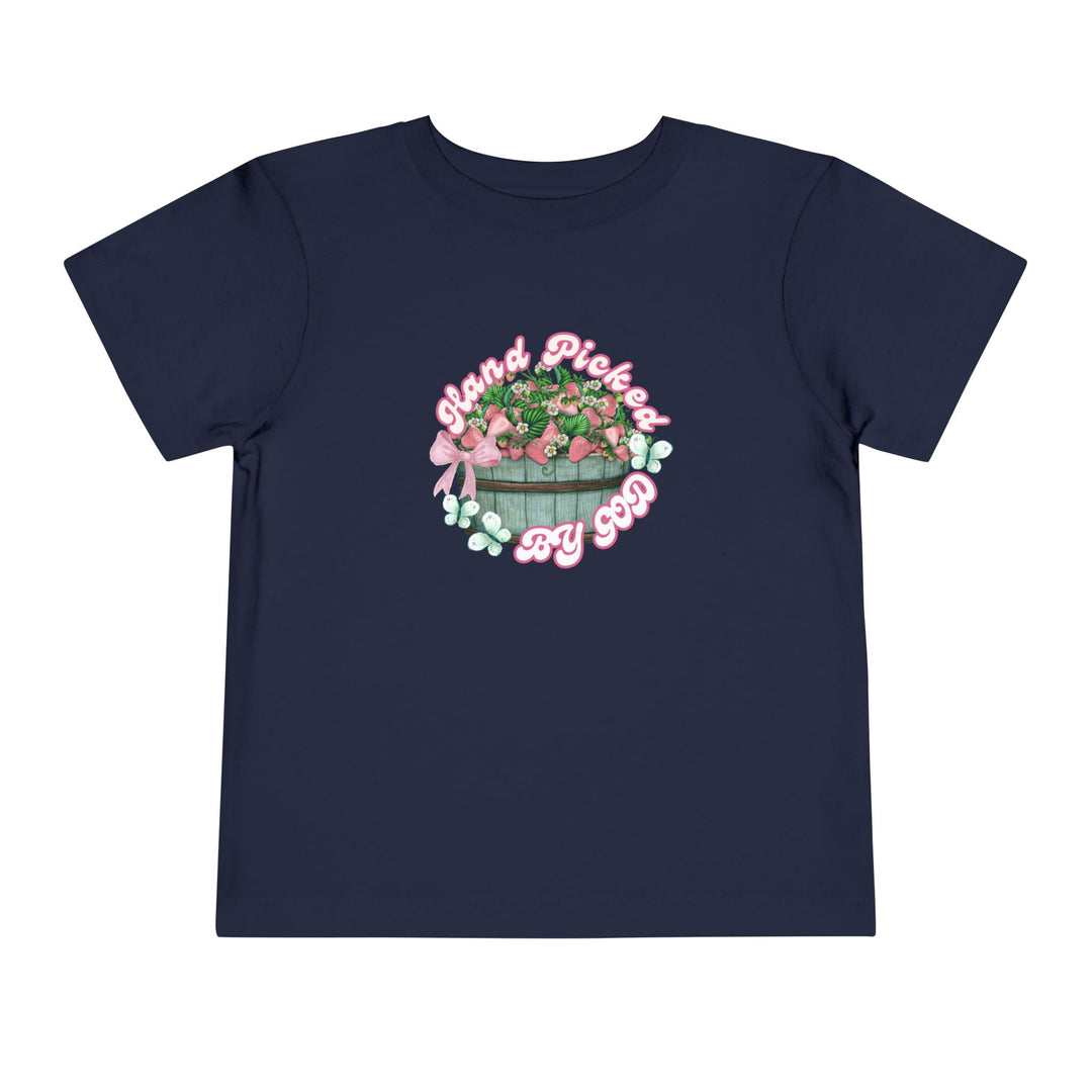 Hand Picked by GOD Toddler Tee, featuring a comfortable 100% Airlume cotton fabric and a tear-away label, ideal for everyday wear by toddlers.