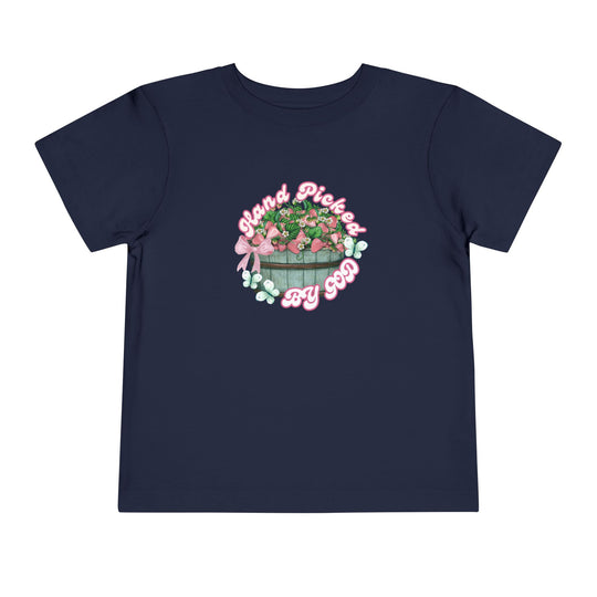 Hand Picked by GOD Toddler Tee, featuring a comfortable 100% Airlume cotton fabric and a tear-away label, ideal for everyday wear by toddlers.