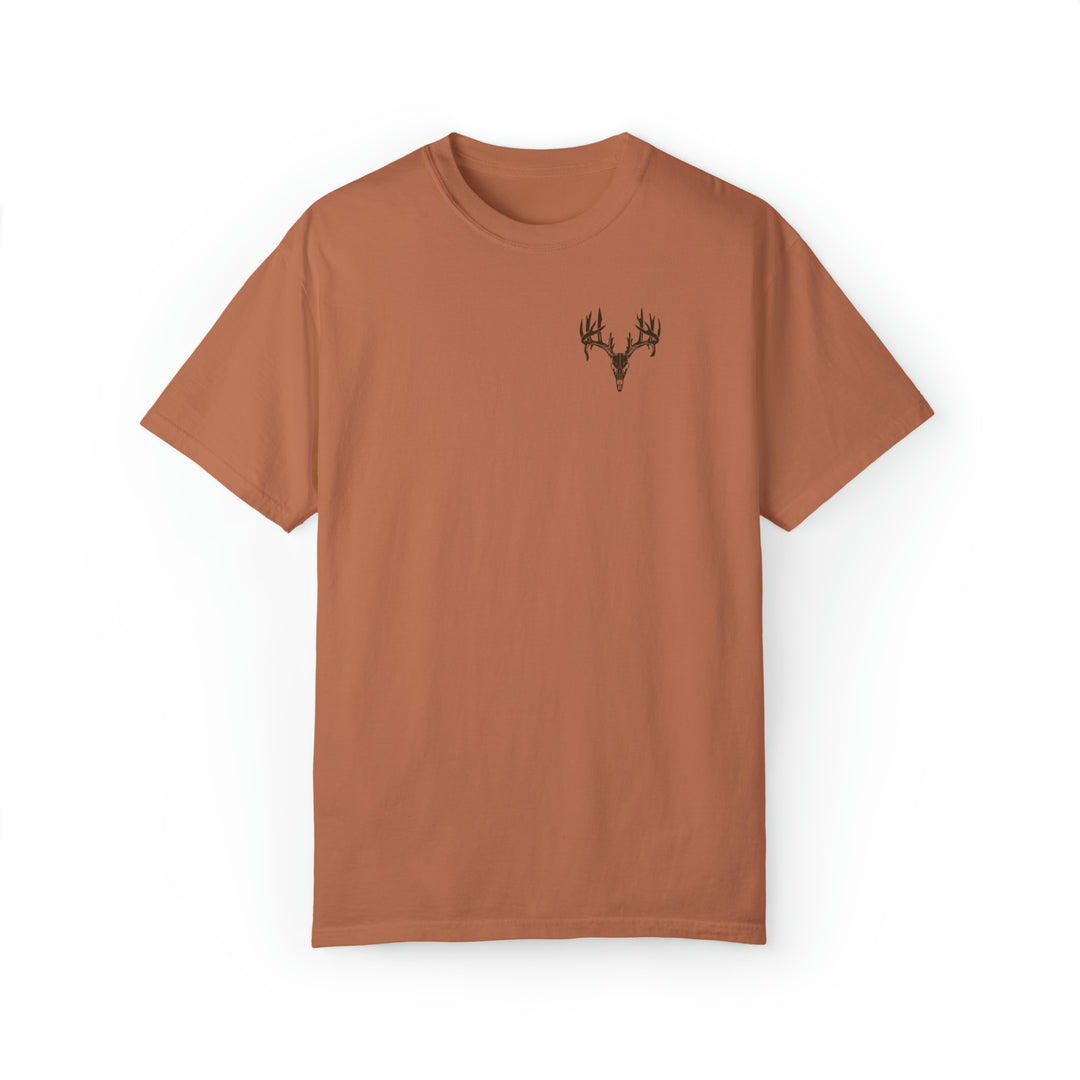 A brown t-shirt featuring a deer head design, part of the Tagged Out Tee collection by Worlds Worst Tees. Unisex, relaxed fit, 80% ring-spun cotton, 20% polyester fabric.