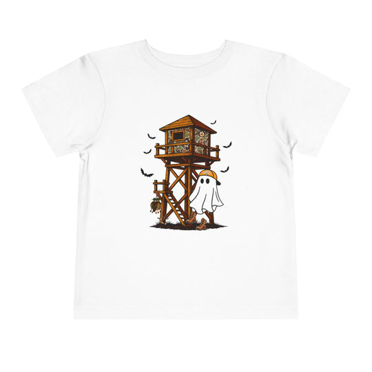 Ghost Hunter Toddler Tee features a playful Halloween hunting scene with a ghost in an orange cap, camo blind, duck decoys, and bats.