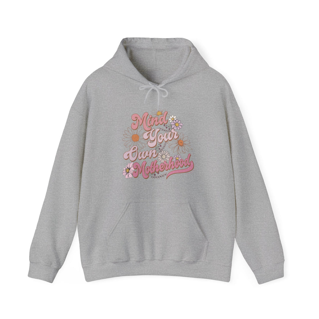 A Mind Your Motherhood Hoodie: Unisex heavy blend sweatshirt with kangaroo pocket and matching drawstring. Plush, warm cotton-poly fabric for ultimate comfort on cold days. Classic fit, tear-away label, true to size.