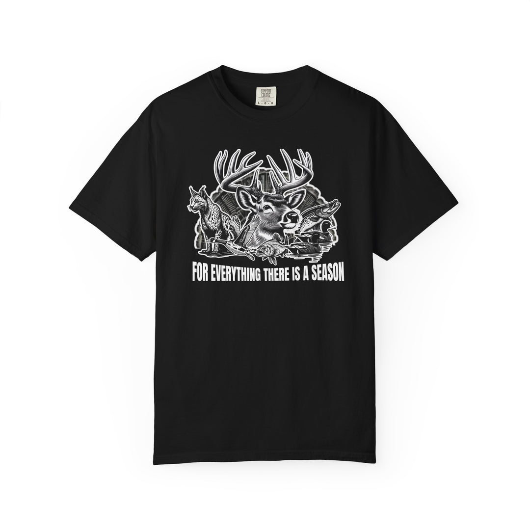 For Everything There is a Season Tee features a wildlife graphic with a buck, fox, ducks, and fish, highlighting nature's cycle, on a black T-shirt.
