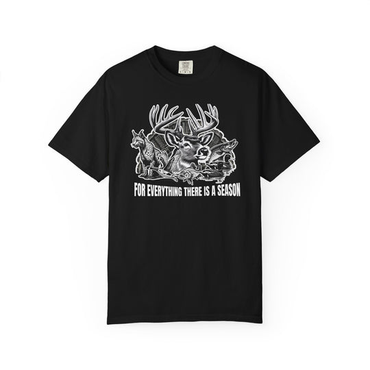 For Everything There is a Season Tee features a wildlife graphic with a buck, fox, ducks, and fish, highlighting nature's cycle, on a black T-shirt.
