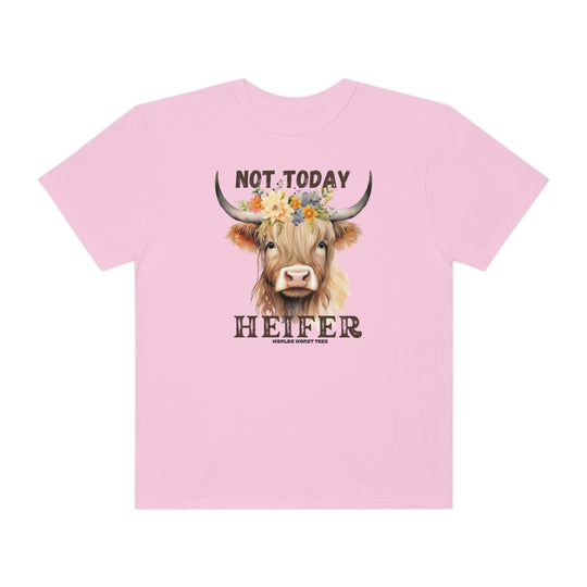 A relaxed-fit Not Today Heifer Tee, featuring a cow design on a pink shirt. Made of 100% ring-spun cotton, garment-dyed for extra coziness and durability. Ideal for daily wear.